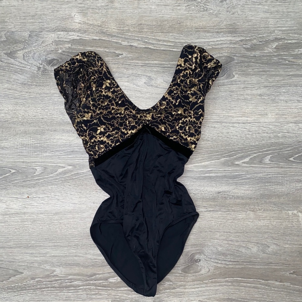 Black and gold class in leotard